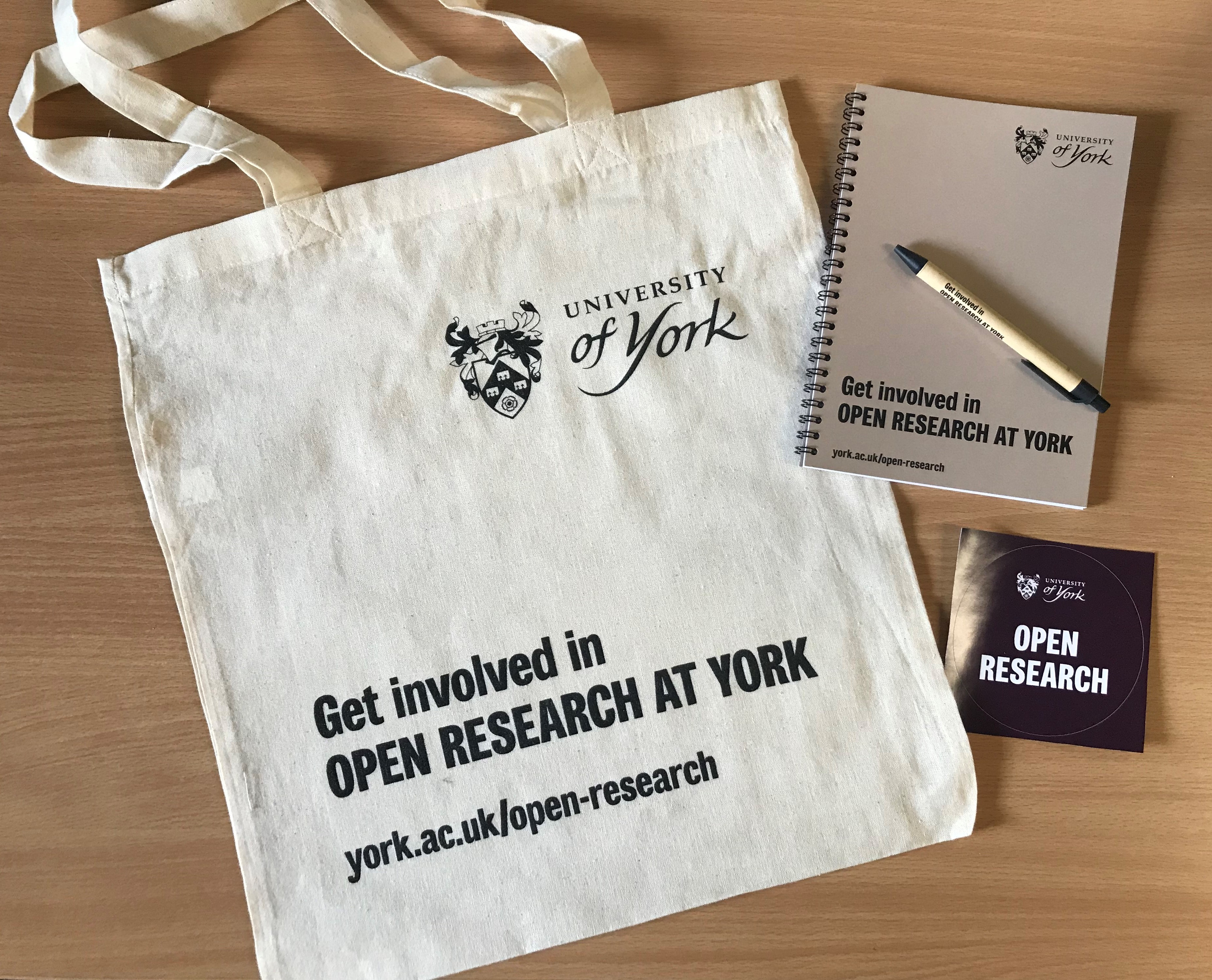 York Open Research goody bag, featuring a tote bag, pen, notebook and vinyl sticker